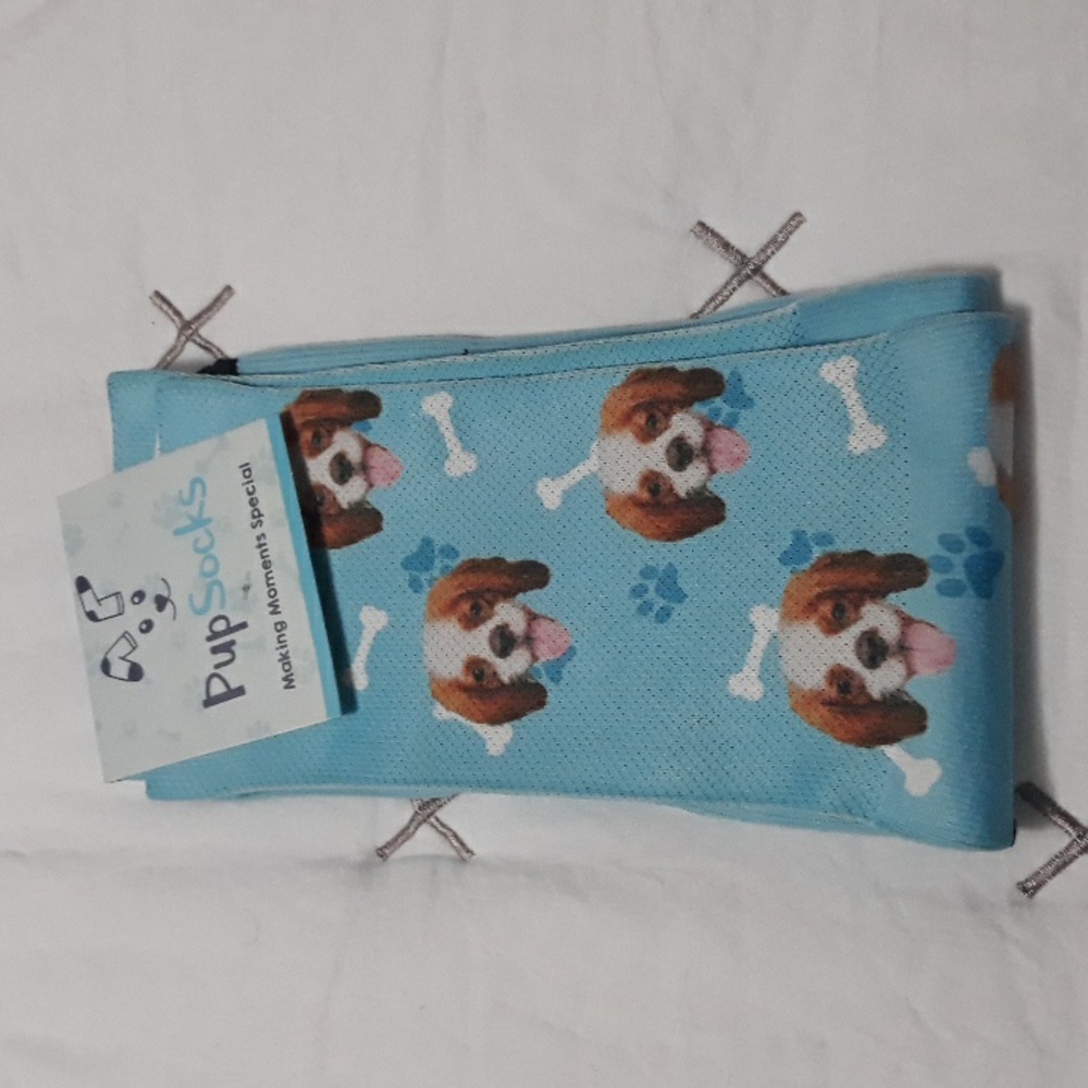 Blue, pink, green, purple socks of Pup-Socks